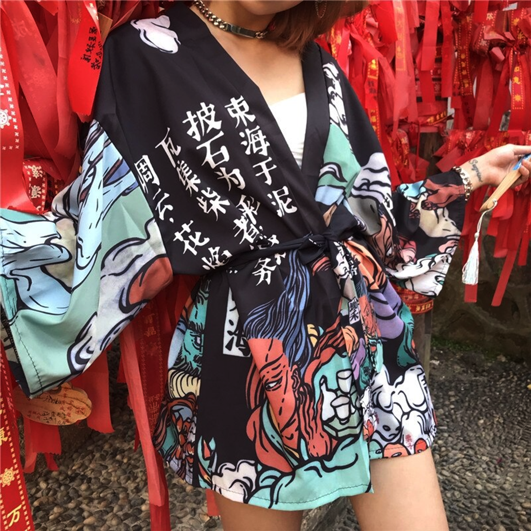 wearing a flowing kimono and tattoos